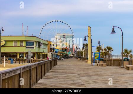 Myrtle Beach boardwalk in the downtown district of the Atlantic coastal town in South Carolina. Stock Photo