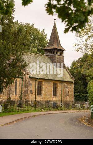 St Helens Church . Boultham Park Lincoln, Lincolnshire, woods, The Commonwealth War Graves Commission site, graveyard, small church, bell ringing. Stock Photo