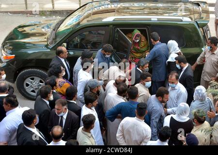 Pakistan's former Prime Minister Nawaz Sharif lays a wreath at the grave of  slain opposition leader Benazir Bhutto in Garhi Khuda Bakhsh, near Larkana,  Pakistan on Saturday, Dec. 29, 2007. (AP Photo/B.K.Bangash