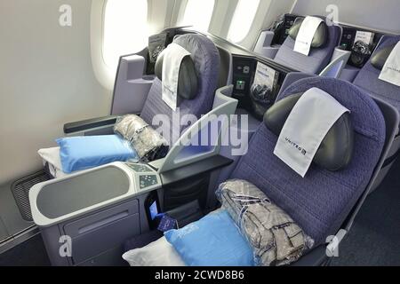 CHICAGO, IL -1 SEP 2020- Inside the premium Polaris Business Class cabin on a Boeing 787 Dreamliner airplane from United Airlines (UA). Stock Photo