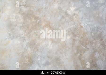 Horizontal Gray concrete background with white and beige hues. Stock Photo