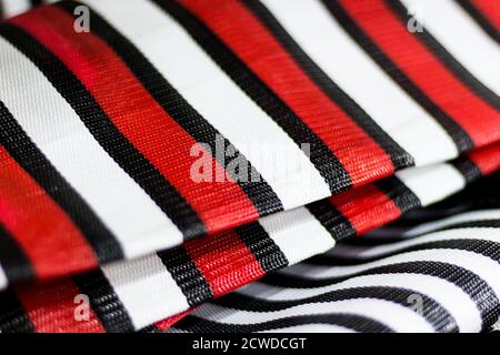 Detail of nylon bags with red and black stripes. Saara, Rio de Janeiro, Brazil. 2019 Stock Photo