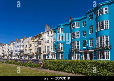 England, East Sussex, Brighton, Kemptown, The New Steine Gardens and Colourful Hotels and Residential Buildings Stock Photo