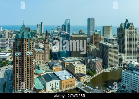 Milwaukee, WI: 23 September 2020:  An aerial image of downtown Milwaukee featuring skyscrapers riverwalk Stock Photo