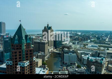 Milwaukee, WI: 23 September 2020:  An aerial image of downtown Milwaukee featuring skyscrapers riverwalk Stock Photo