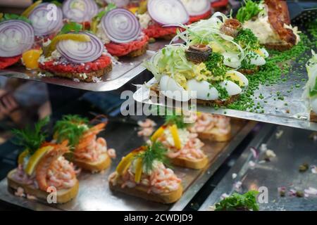 A variety of smorrebrod open faced sandwiches in Copenhagen, Denmark Stock Photo