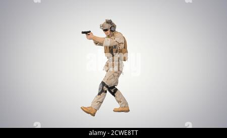 Soldier walking and aiming with a pistol on white background Stock ...