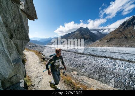 Trail running near Aletsch glacier, Switzerland Stock Photo