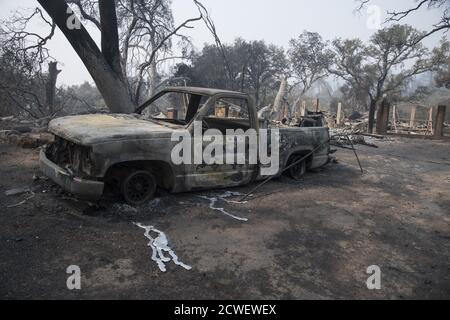 Angwin, United States. 29th Sep, 2020. Aluminum melted out of a truck leaves a trail in Angwin, California on Tuesday, September 29, 2020. The Glass Fire has burned over 40,000 acres and is only 2% contained. Photo by Terry Schmitt/UPI Credit: UPI/Alamy Live News Stock Photo