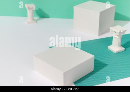 Mock up with podium for product display and gypsum sculpture Stock Photo
