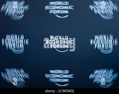 A logo is pictured after a news conference at the WEF headquarters in Cologny near Geneva January 19, 2011. The 2011 Annual Meeting will take place January 26 to 30. Picture taken with long exposure. REUTERS/Valentin Flauraud (SWITZERLAND)