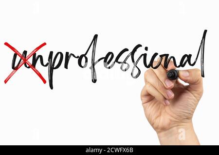 Сrossed out letters to write professional. Doodle on a whiteboard, written with black and red marker in a hand. Scribble sketch text on a board Stock Photo