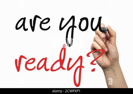 Are you ready phrase on a whiteboard, written with marker in a hand. Stock Photo