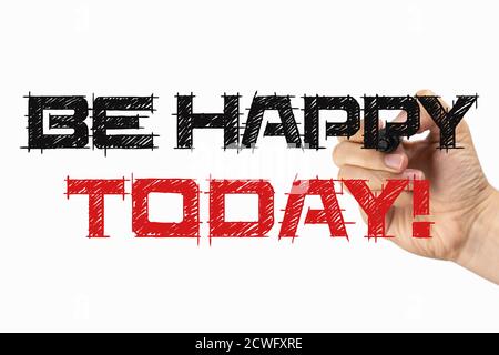 Be happy today. Phrase on a whiteboard, written with black and red marker in a hand. Scribble sketch text on a board Stock Photo