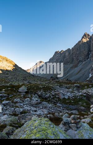 Highest part of Velka Studena dolina valley bellow Prielom saddle with stones, peaks and clear sky in Vysoke Tatry mountains in Slovakia Stock Photo