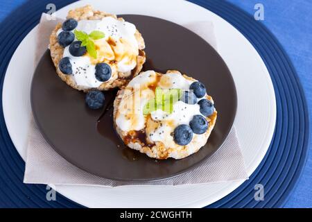 Fresh healthy sandwiches with cream cheese and blueberries Stock Photo