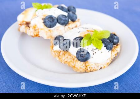 Fresh healthy sandwiches with cream cheese and blueberries Stock Photo