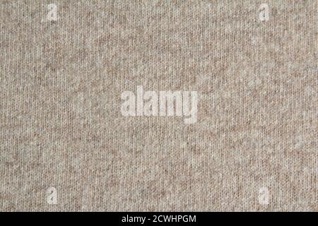 Pattern with beige wool fabric for clothing design. Colorful abstract seamless pattern. Beige background. Horizontal orientation Stock Photo