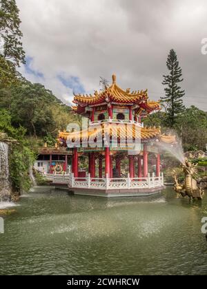 Taipei, Taiwan - October 19, 2016: Colorful pagoda and gold dragon near the Zhinan Temple Station of Maokong Gondola, Taipei, Taiwan Stock Photo