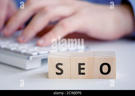 Search engine optimization concept on wooden cubes. Stock Photo
