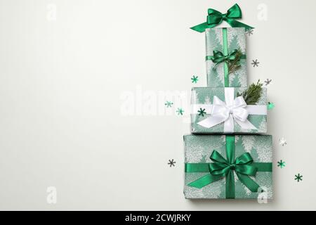 Christmas tree made of gift boxes on white background Stock Photo