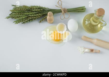 The composition includes natural products. Butter and broken egg. Agricultural industry Stock Photo