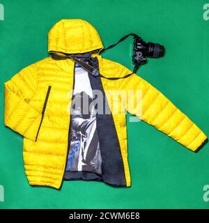 Yellow man jacket with a camera decor isolated Stock Photo
