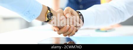 Handshake between businessman and businessman at meeting in office. Stock Photo