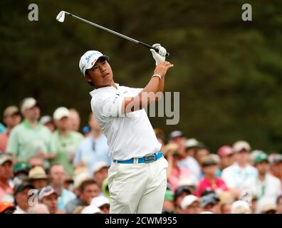 Hideki Matsuyama of Japan hits off the 12th tee during final round play of the Masters golf tournament at the Augusta National Golf Course in Augusta, Georgia April 12, 2015.   REUTERS/Jim Young