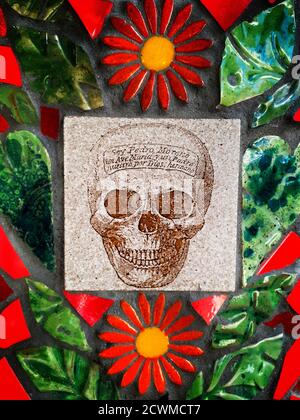 Skull and flowers in broken tiles. Day of the Dead. Stock Photo