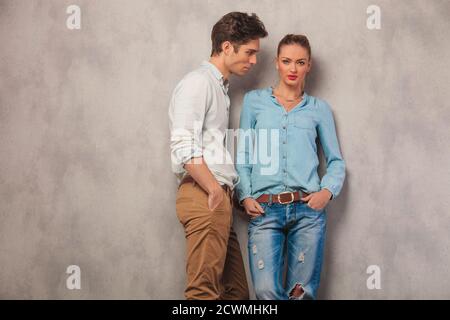 man pose looking away while woman is looking at the camera with Stock Photo  | Adobe Stock