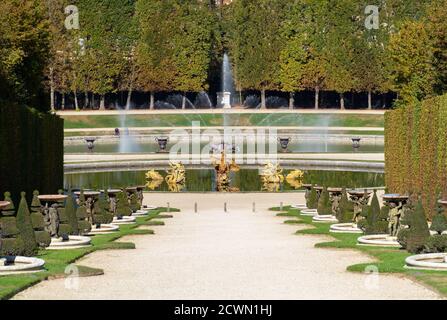 Marmousets walk with Dragon and Neptune Fountains in Versailles Gardens - France Stock Photo