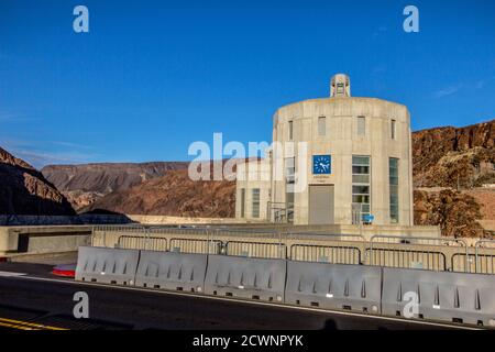 Arizona Time. Large clock displays Arizona time at the Hoover Dam on the Nevada and Arizona state border. Stock Photo