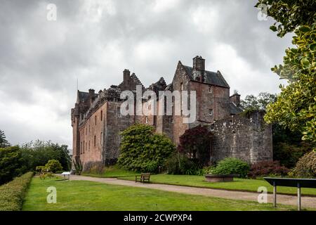 Brodick Castle stands in an elevated position at the foot of Goatfell mountain on the island of Arran, Scotland. Stock Photo