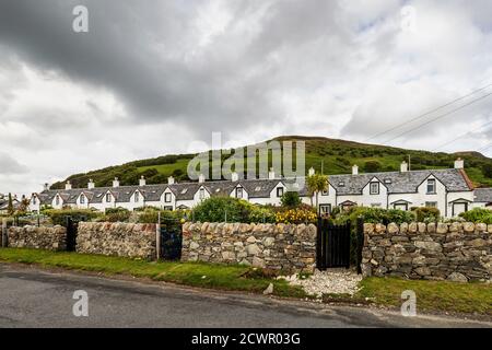 The Twelve Apostles, a row of fishermen's cottages, in Catacol, Isle of Arran, North Ayrshire, Scotland, UK Stock Photo