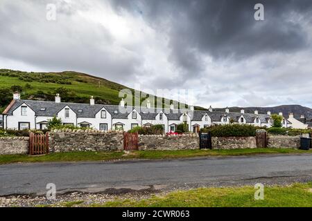 The Twelve Apostles, a row of fishermen's cottages, in Catacol, Isle of Arran, North Ayrshire, Scotland, UK Stock Photo