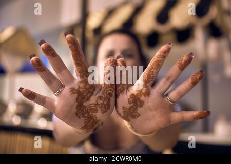 photography of hands with henna Stock Photo