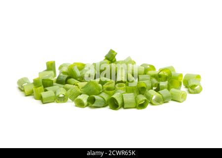 Slices of green onions on a white background Stock Photo