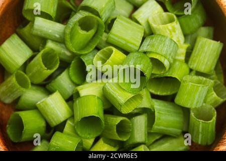 Slices of green onions in a close and top view Stock Photo