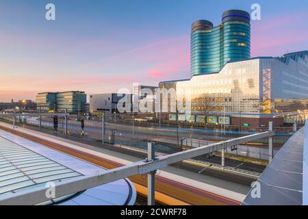 Utrecht, Netherlands cityscape over train station platforms at dawn. Stock Photo