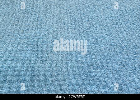 Rough light turquoise blue color blanket detail texture background made from plush furry fleece knitting material use to warm and cozy body when sleep Stock Photo