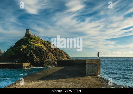 old lanyu lighthouse at Kaiyuan Harbor, lanyu, taiwan Stock Photo