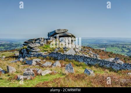 The dramatic rocky landscape of Bodmin Moor in Cornwall from up high on the granite ridge of Bearah Tor just outside the village of famous Minions. Stock Photo