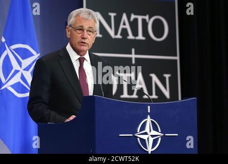 U.S. Secretary of Defense Chuck Hagel addresses a news conference during a NATO defence ministers meeting at the Alliance headquarters in Brussels February 27, 2014. Russia must be transparent about military exercises along Ukraine's border and not take any steps that could be misinterpreted or 'lead to miscalculation during a delicate time,' Hagel said on Thursday. REUTERS/Francois Lenoir (BELGIUM - Tags: POLITICS MILITARY)