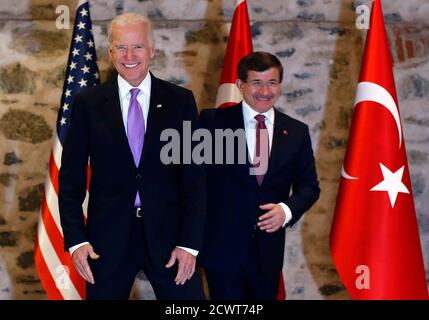 U.S. Vice President Joe Biden (L) and Turkey's Prime Minister Ahmet Davutoglu arrive at their meeting in Istanbul November 21, 2014. Turkey and the United States played down differences in the fight against Islamic State on Friday, but Prime Minister Ahmet Davutoglu made clear Ankara would keep pressing for a no-fly zone in Syria and President Bashar al-Assad's removal. REUTERS/Murad Sezer (TURKEY - Tags: POLITICS)