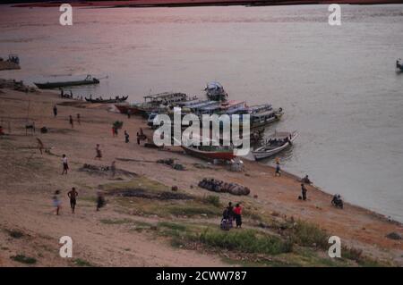 A bird's eye view of the riverbanks with traditional wooden boats dock at the banks Stock Photo