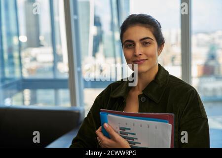 Portrait confident businesswoman in office Stock Photo