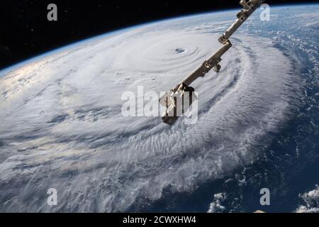 Dramatic Views of Hurricane Florence from the International Space Station From 9/12 Hurricane Florence  iss056e162175 (Sept. 12, 2018) --- Cameras outside the International Space Station captured a stark and sobering view of Hurricane Florence the morning of Sept. 12 as it churned across the Atlantic in a west-northwesterly direction with winds of 130 miles an hour. The National Hurricane Center forecasts additional strengthening for Florence before it reaches the coastline of North Carolina and South Carolina early Friday, Sept. 14. Stock Photo