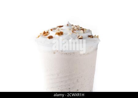 White chocolate, vanilla and nuts iced milkshake isolated on white background Stock Photo