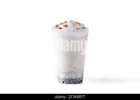 White chocolate, vanilla and nuts iced milkshake isolated on white background Stock Photo